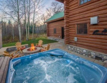 Hot tub on the deck of Aspens rental property in Jackson Hole